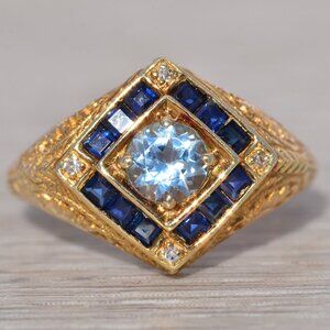 Aquamarine, Sapphire, and Natural Diamond Ring in Yellow Gold